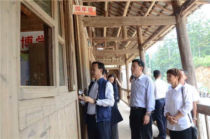 （第四张）活动组一行实地考察九曰小学.jpg